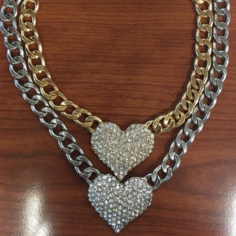 1 Gold & 1 Silver Heart Necklace (both included)